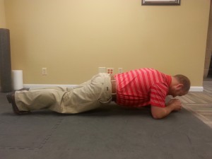 front plank demonstrated by Dr. Curtis