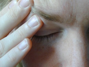 Closeup of patient with headache pain