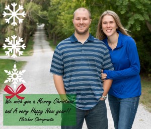 "We wish you a Merry Christmas and a very happy New Year!" Holiday Card from Fletcher Chiropractic featuring Drs. Curtis and Kadi Fletcher