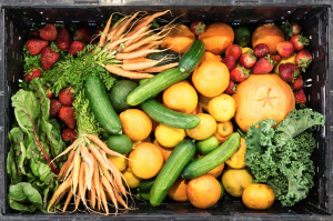 Crate of fresh fruits and vegetables